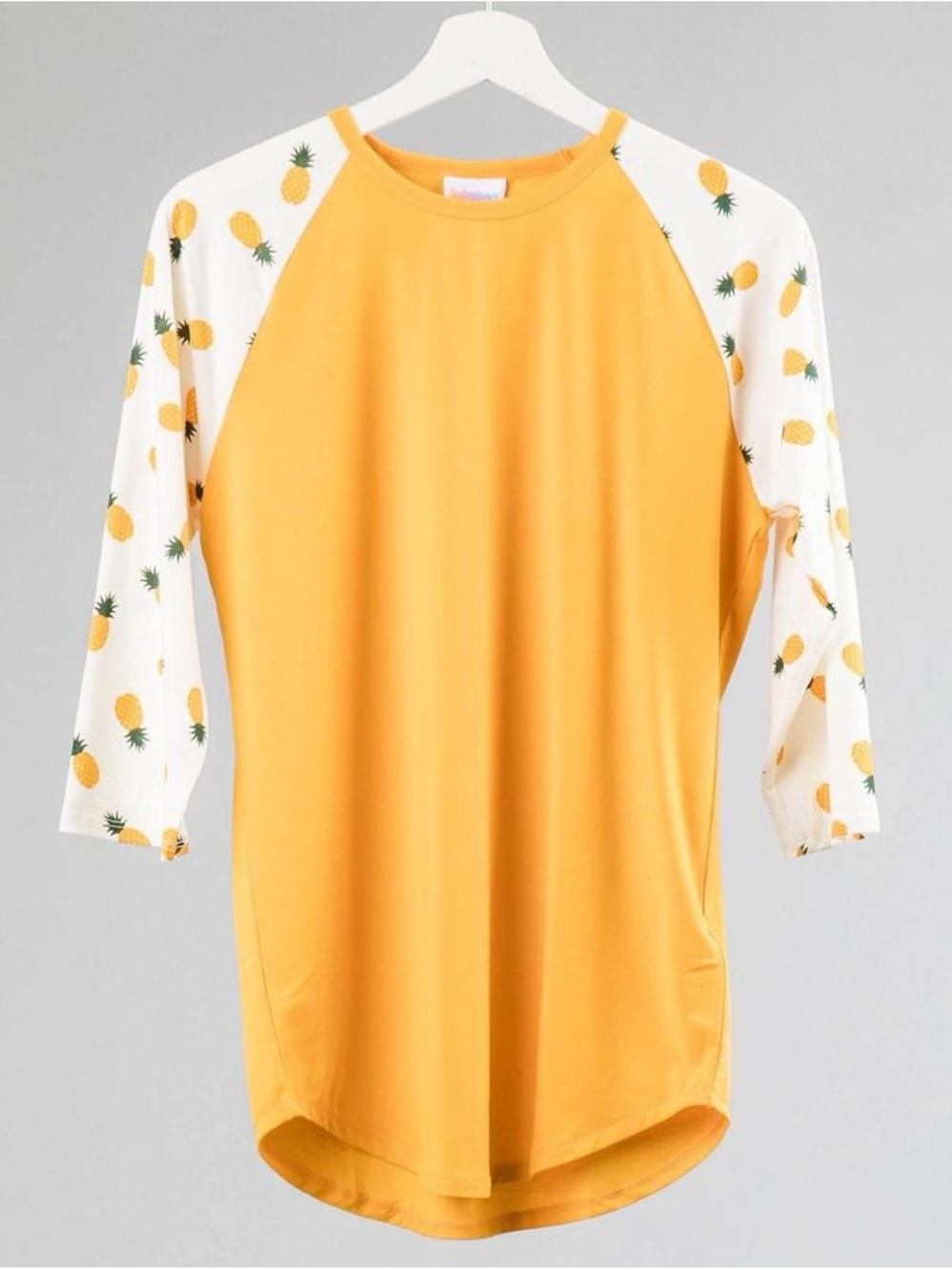 LuLaRoe Yellow Raglan Top with Pineapple Print Sleeves